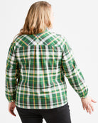 Person wearing a green plaid shirt on a white background. This top is the Vernon Shirt sewing pattern from Cashmerette.